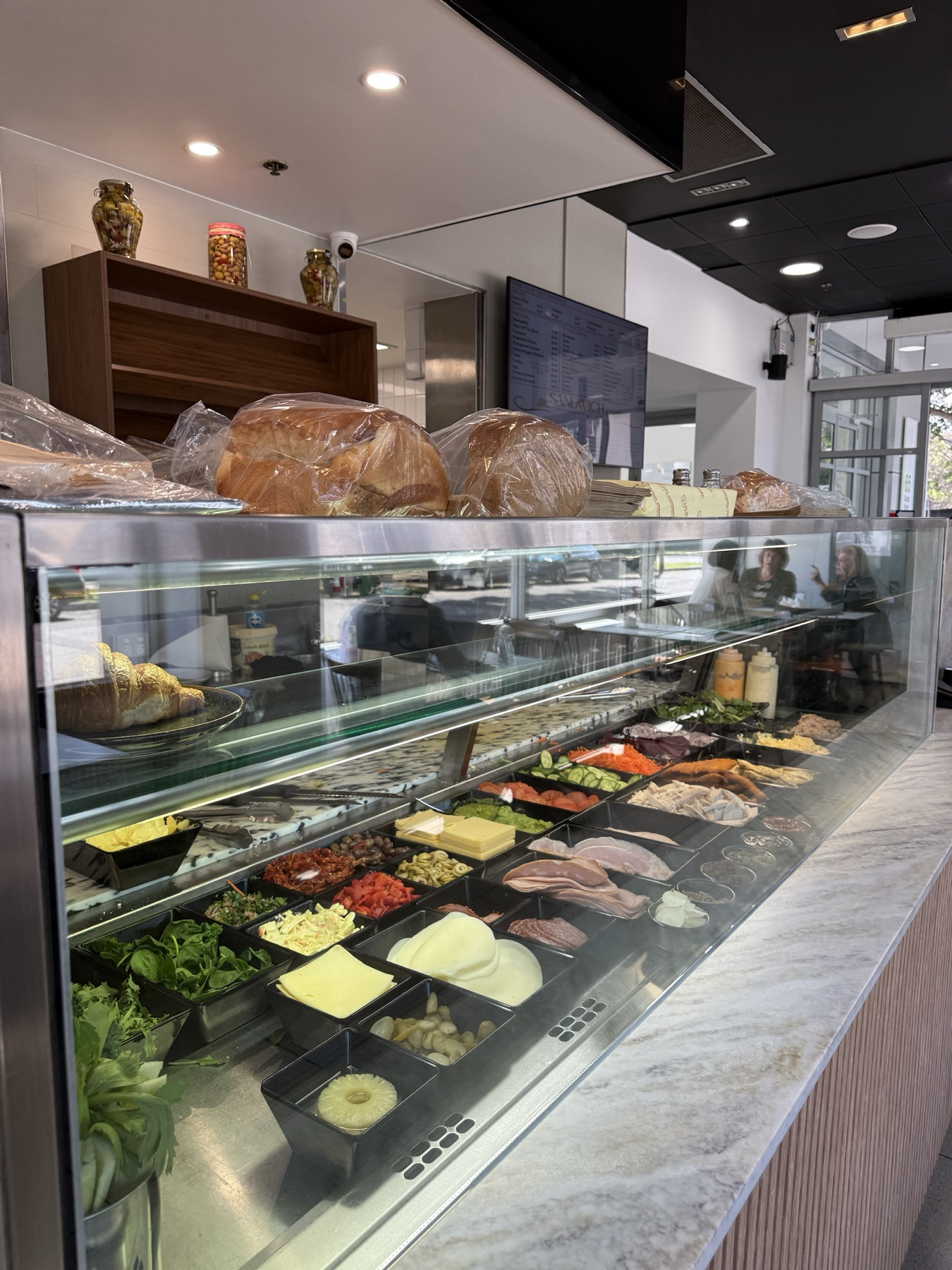 The sandwich counter: cheeses, meats, salads and fresh bread