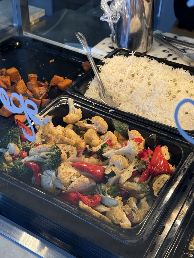 Roast vegetables, sweet potato and rice in the hot food bar